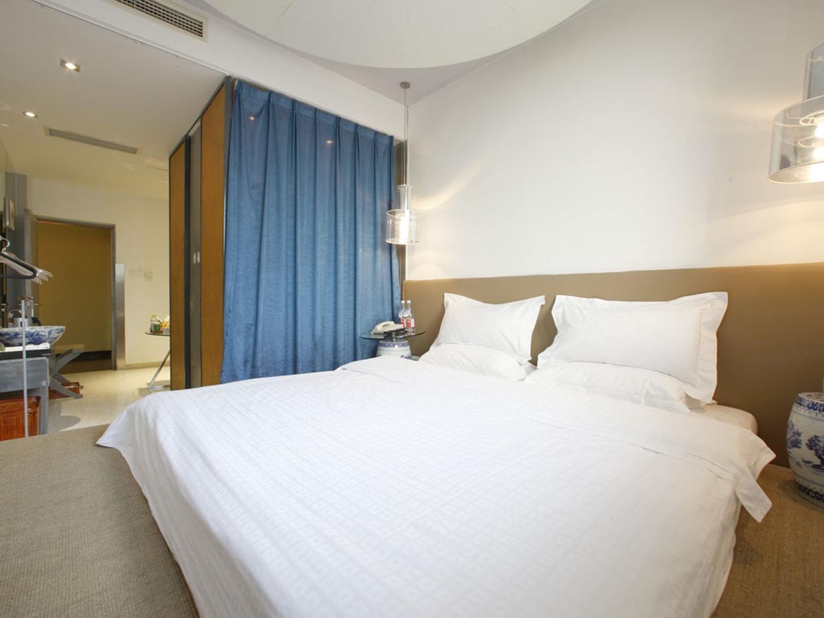 China Community Art Habitat Hotel Thanh Đảo Phòng bức ảnh